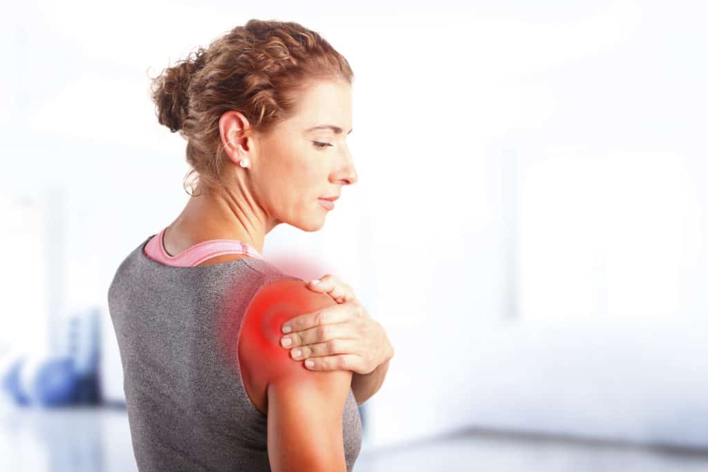shoulder injury of woman after working out