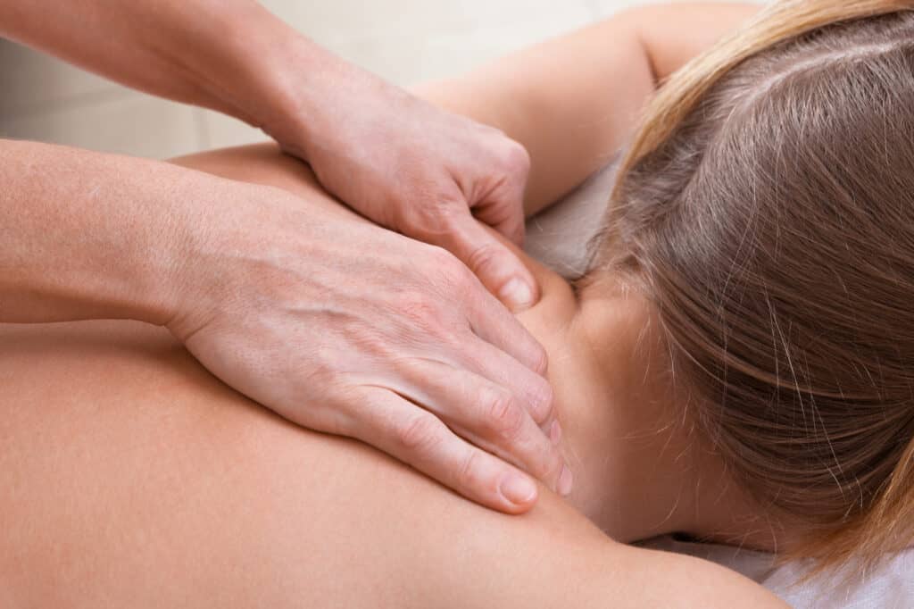 neck massage in a physical therapist