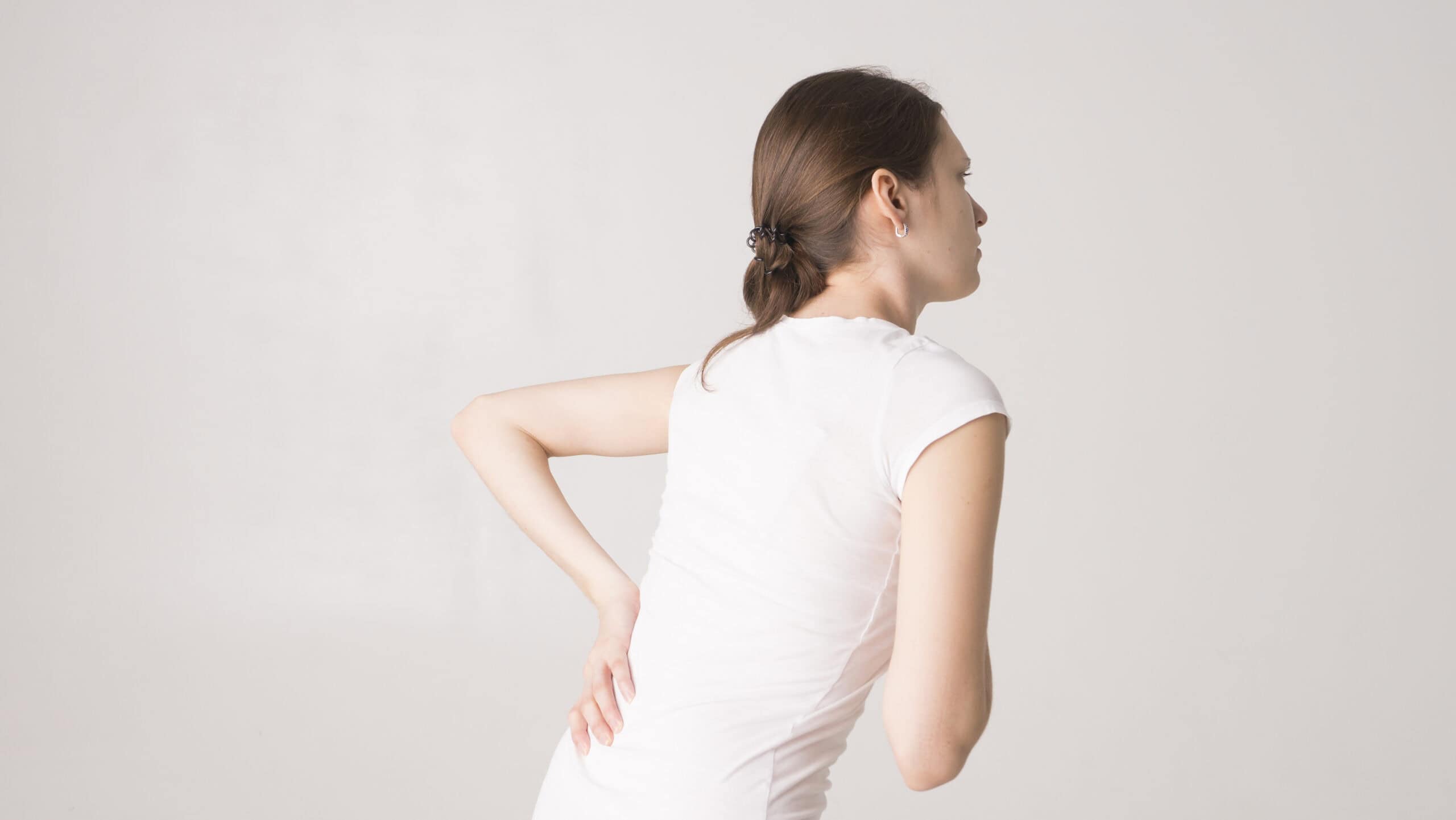woman with stress and back pain