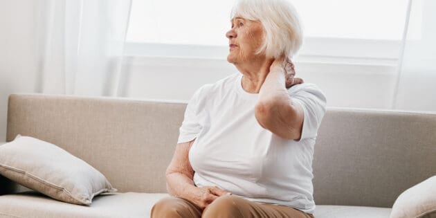 woman suffering from cervical spinal stenosis