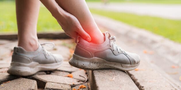woman with ankle pain when walking