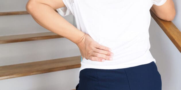 woman with lower back and hip pain