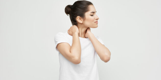 woman doing tech neck exercises