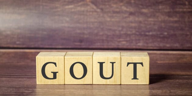 a wooden blocks with black letters on for gout pain