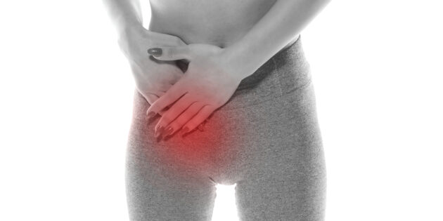 woman struggling with groin pain
