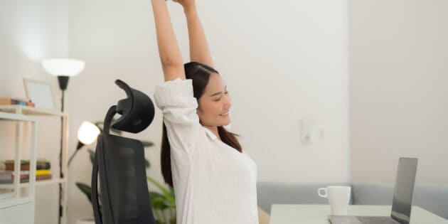 woman doing desk stretch