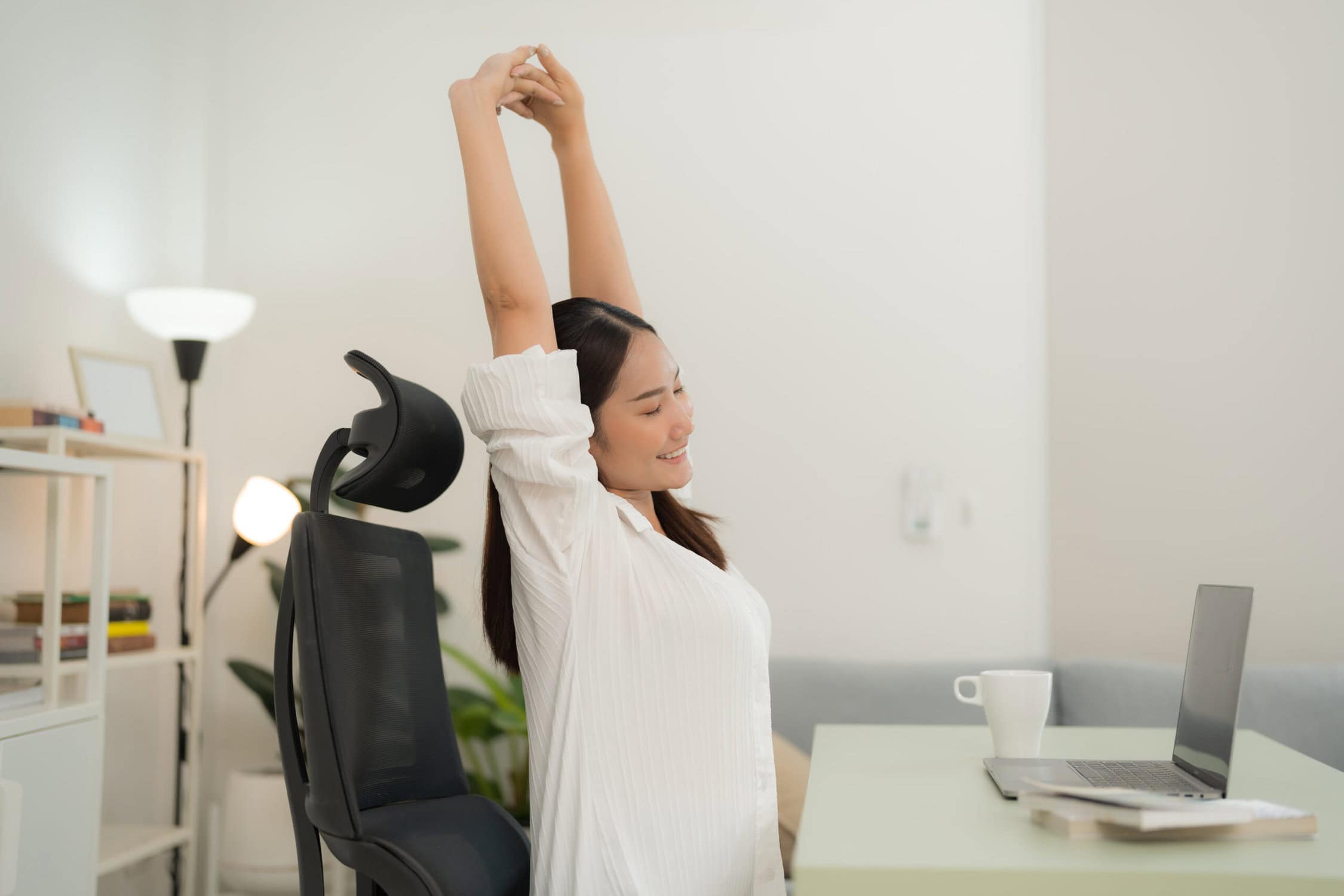 woman doing desk stretch